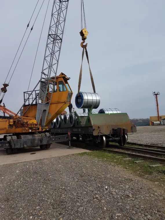 METAL COILS TRANSSHIPMENT & RAIL–ROAD TRANSPORTATION